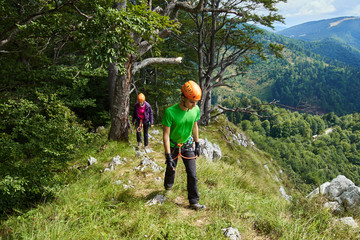 People in via ferrata equipment