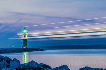 night view of lighthouse of Warnemuende on the Baltic Sea at the