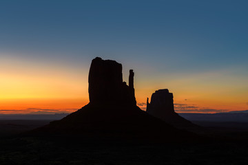 Silhouette of Monument Valley at sunrise,  Arizona.