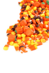 Halloween candy corns on white background
