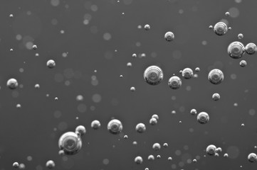 Underwater air bubbles in the black-and-white. Macro