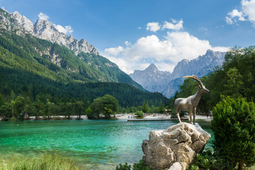 Jasna lake in Slovenia -  turquoise lake with mountains in the back