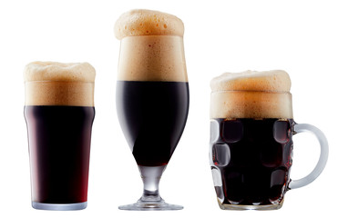 Mug of frosty dark beer with foam isolated on a white background