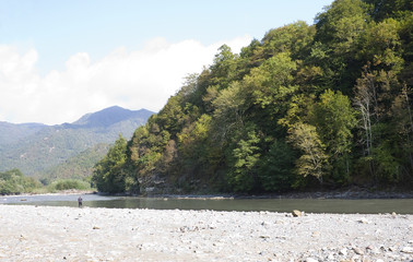 Beautiful landscape with river and mountains. The White river is in the North Caucasus