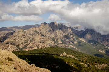 Obraz premium The Aiguilles de Bavella are rocky spikes of red granite that dominate the hill of the same name. The name means needles of Bavella. 