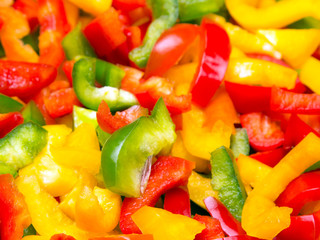 Fresh colorful  cut bell peppers texture for background. Shallow depth of field