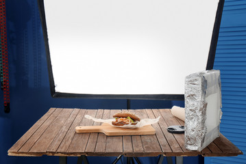 Photo studio with professional lighting equipment during shooting food