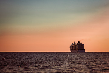 Fototapeta premium Giant cruise ship at sunset