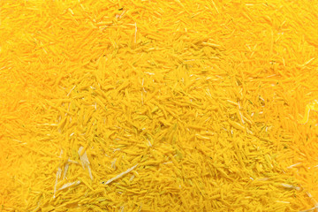 Shavings of yellow graphite pencil, closeup