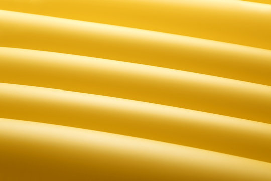 Bright yellow fabric, closeup