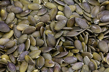 Background made of shelled pumpkin seeds