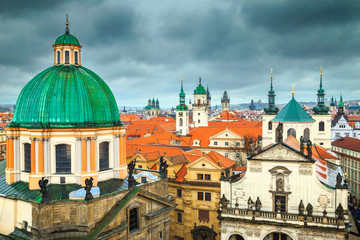 Fototapeta na wymiar Fantastic Prague cityscape with colorful house roofs and towers, Europe