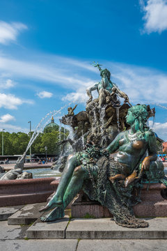 Neptunbrunnen or Neptune fountain at Alexanderplatz square, Berlin, Germany