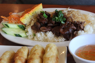 Different plates of asian food