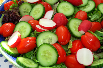 A plate full of healthy salad produce