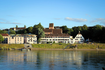 Fototapeta na wymiar Scenic Rhine River embankment in Basel, Switzerland