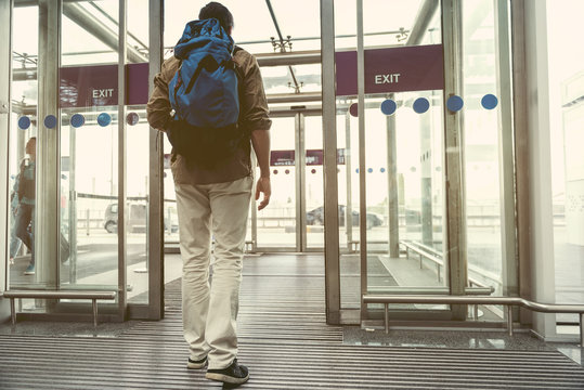 Adult guy is going out of doors