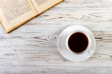 Cup of coffee on a wooden table