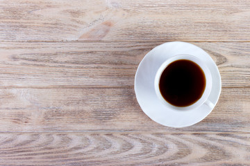 Cup of Coffee on Wooden Table, Top View
