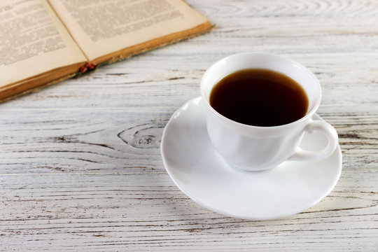 Drink a cup of coffee reading book