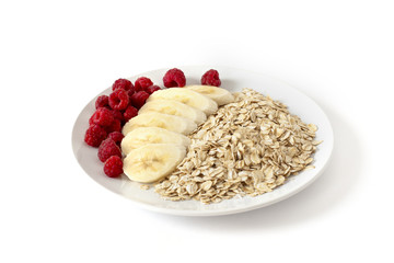 Breakfast of oatmeal with berries and bananas