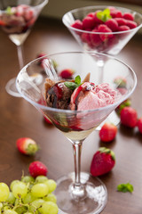 Strawberry ice cream with chocolate, cream and strawberries