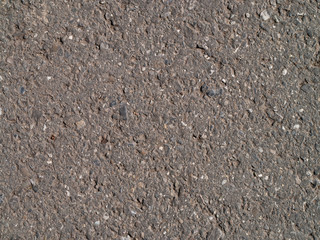 Close up of asphalt on a street, useful as background, texture or many more...	