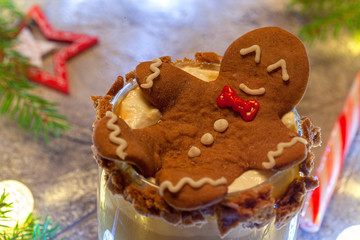 Drunken Gingerbread cookie man in a Christmas cocktail