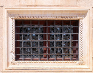 Vintage window with lattice of old stone house