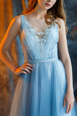 Obraz na płótnie Canvas sweet bride in an blue gown
