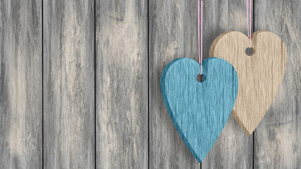 Dwa serca z drewna zawieszone na sznurku - obrazy, fototapety, plakaty