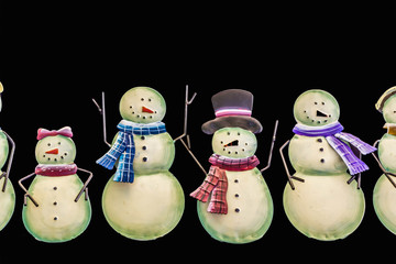 Snowmen on a black background.