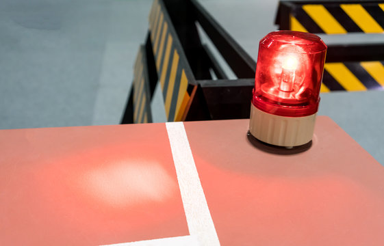 Red Siren On Metal Cabinet. Warning Light For Safety