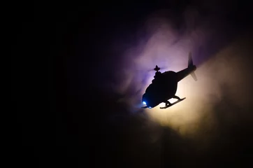 Fototapeten Hubschrauber über Feuersonnenunterganghorizont. Krieg Konzept. Militärische Szene des fliegenden Hubschrauberfeuer-Backgroung-Effekts. Dekoration © zef art