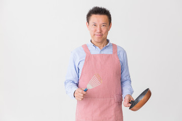 エプロン姿のミドル男性