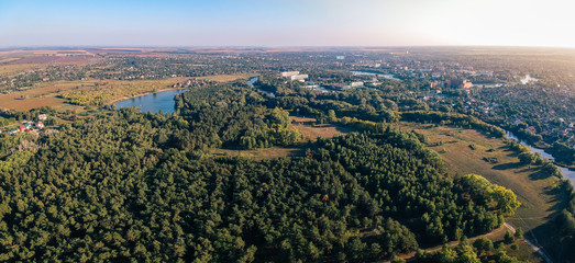 Aerial view on Mirgorod city from park side, Ukraine. Old photo style, sunset image 