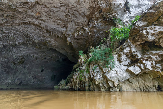 Beautiful natural scenery of Phong cave with boat tour at Ba Be Lake Nation Park is famous travel destination in Bac Kan province, Vietnam.