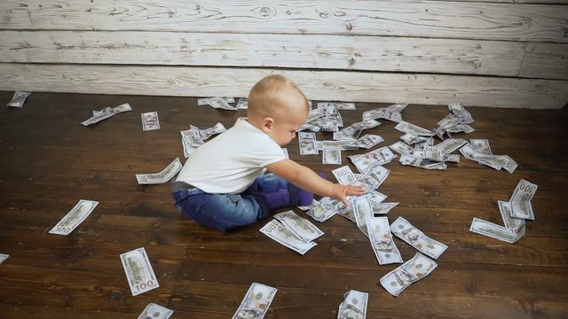 baby boy and a lot of money on the floor hd
