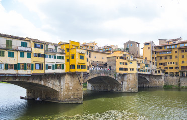 Fototapeta na wymiar Iconic Vecchio Bridge in Florence over river Arno called Ponte Vecchio