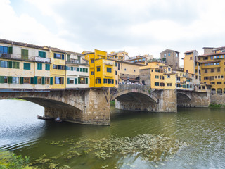 Fototapeta na wymiar Iconic Vecchio Bridge in Florence over river Arno called Ponte Vecchio
