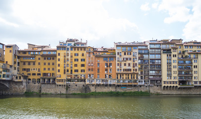 Fototapeta na wymiar Beautiful buildings along Arno River in Florence