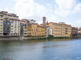 Fototapeta na wymiar Beautiful buildings along Arno River in Florence