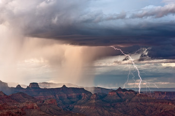 Naklejka na ściany i meble Dramatic lightning storm over the Grand Canyon in Grand Canyon National Park, Arizona