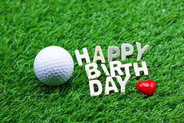 Naklejka premium Happy birthday to golfer word on green grass with golf ball