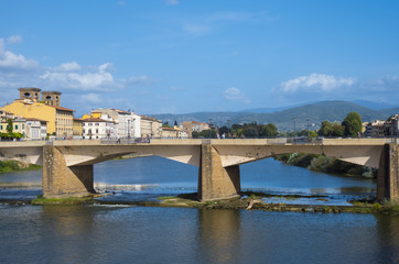 Fototapeta na wymiar The bridges over River Arno in Florence