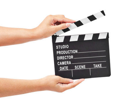 Blank movie production clapper board or slate film in hand.
