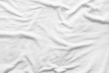 White towel texture for background. That fabric or textile consist of cotton fiber material. Look plush, fluffy, dry, soft and clean. For background about baby, spa, hotel, laundry and hygiene etc.