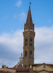 Fototapeta na wymiar Badia Fiorentina Church in the city center of Florence