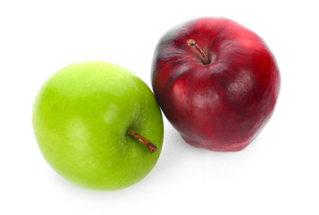 Green and red apple on white background.