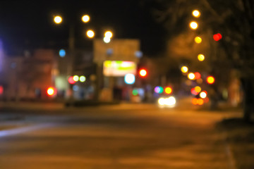 Fototapeta na wymiar Bokeh blurred car lights at the night
